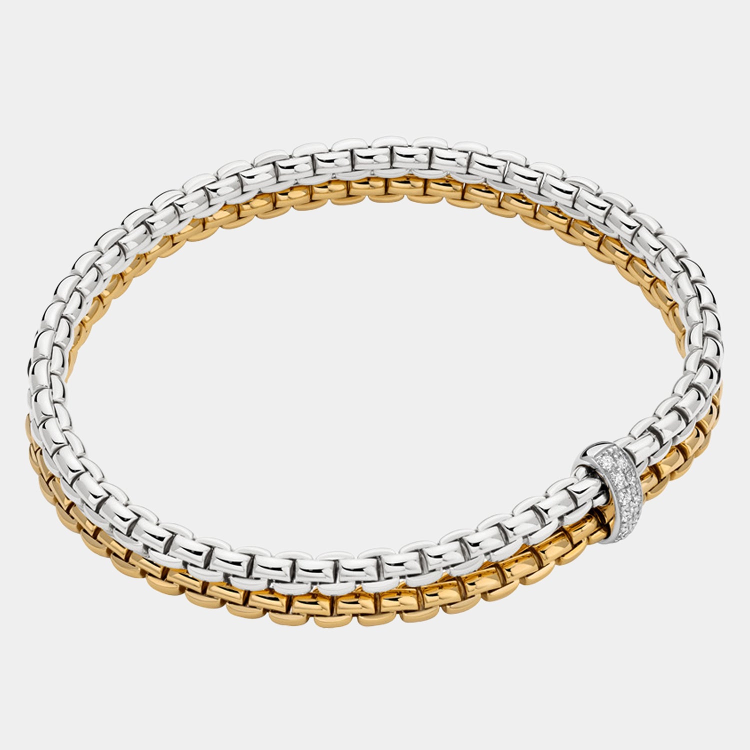 Two-layered bracelet with silver and gold tones on a grey background