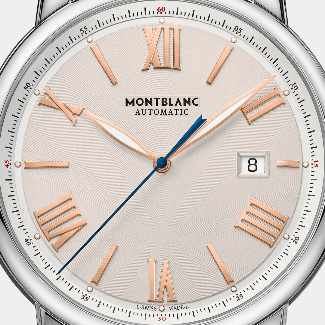 Montblanc watch face with rose gold hands and a silver case.