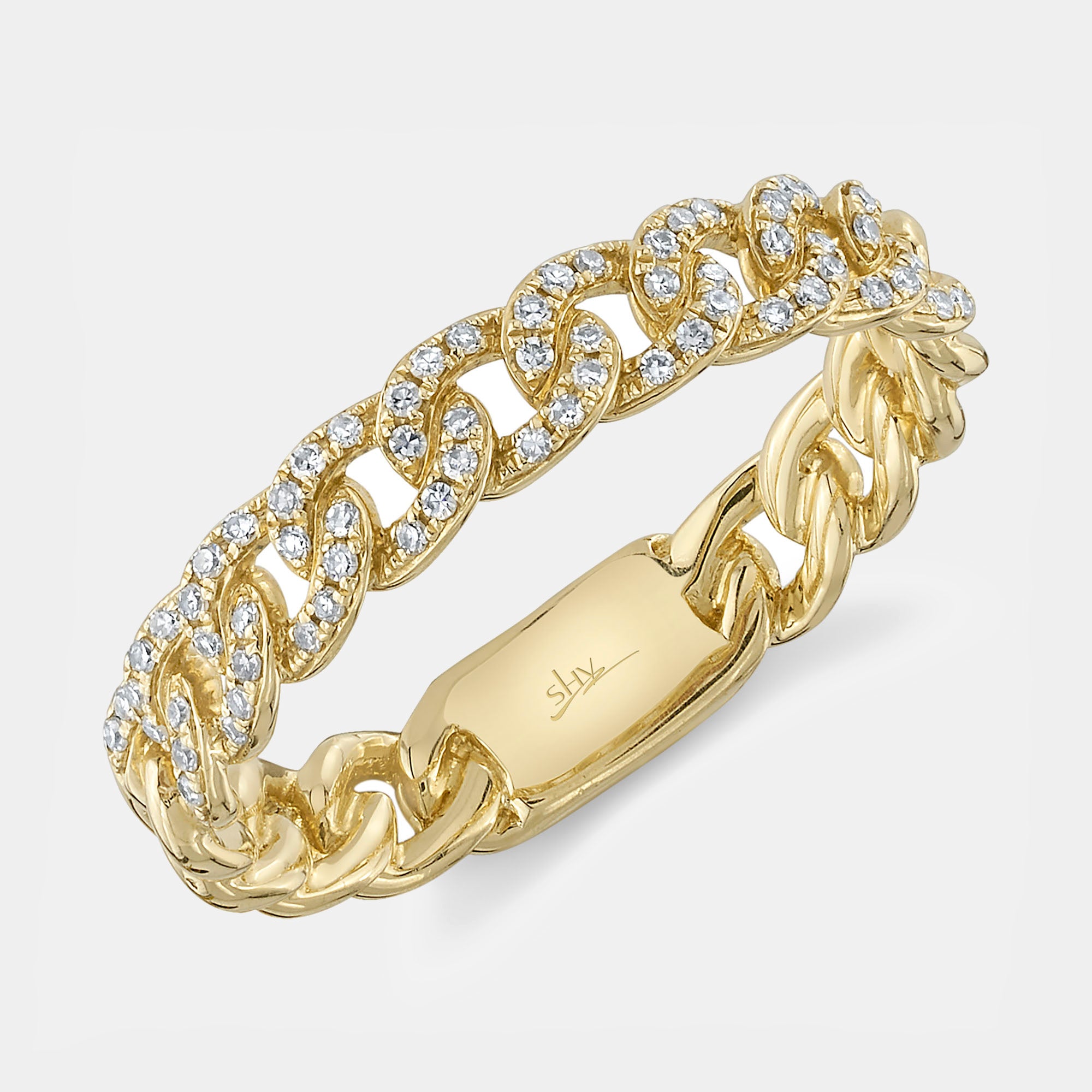 Yellow gold diamond link ring, top down angle view