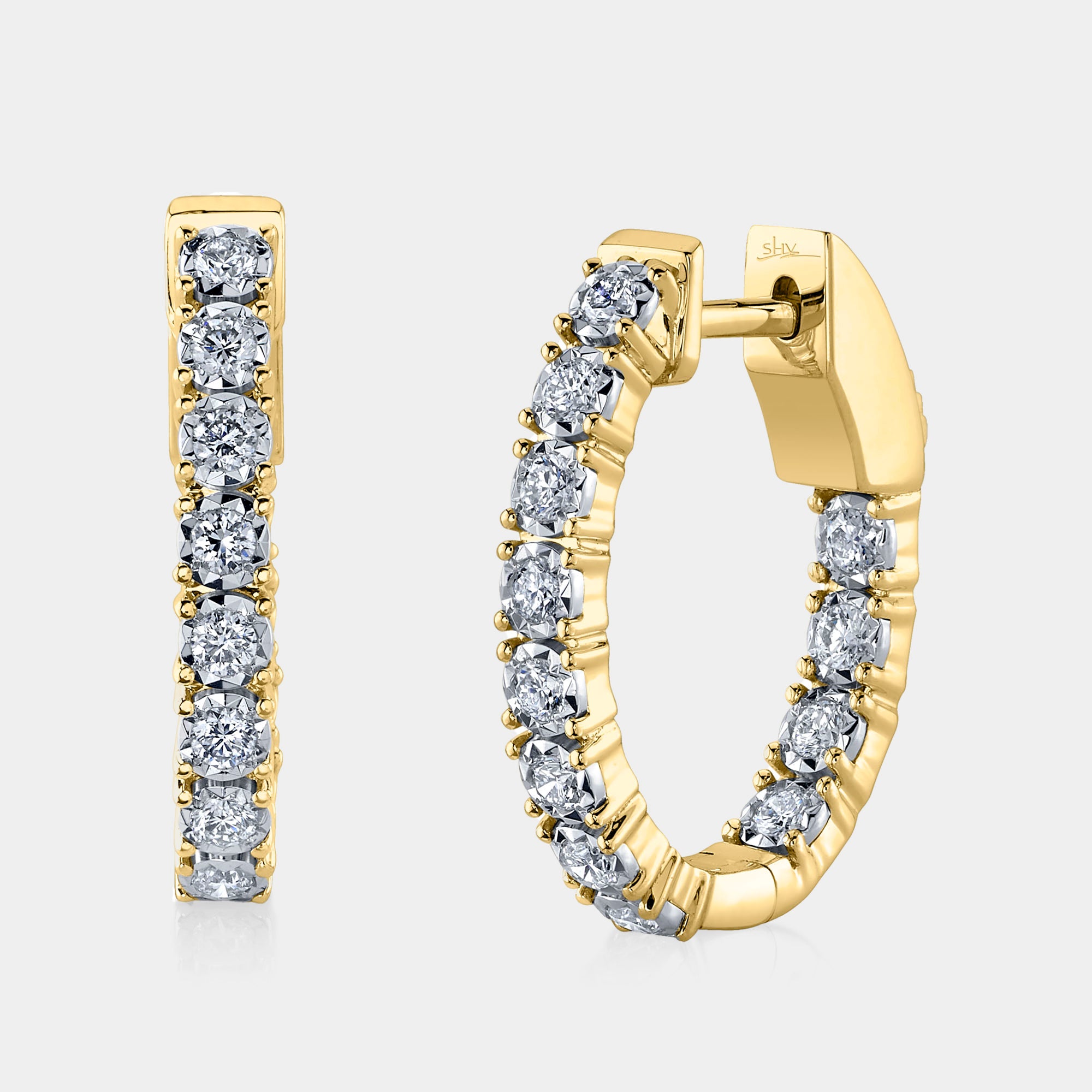 Yellow gold diamond hoop earrings, front angle view