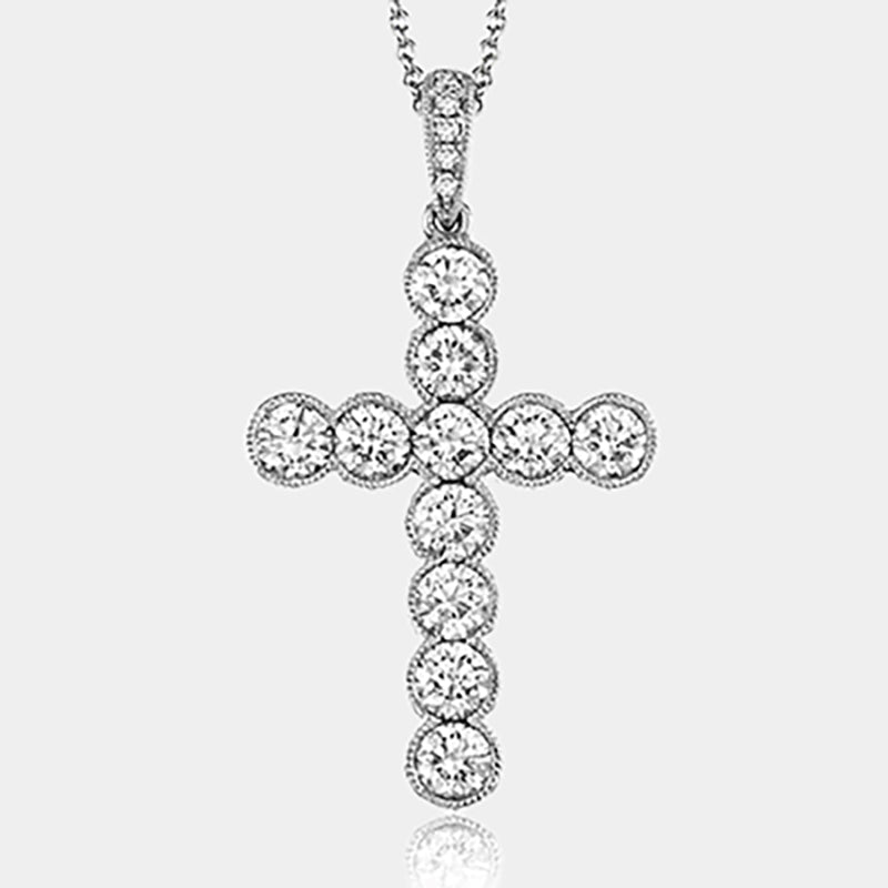 Bezel set diamond cross pendant