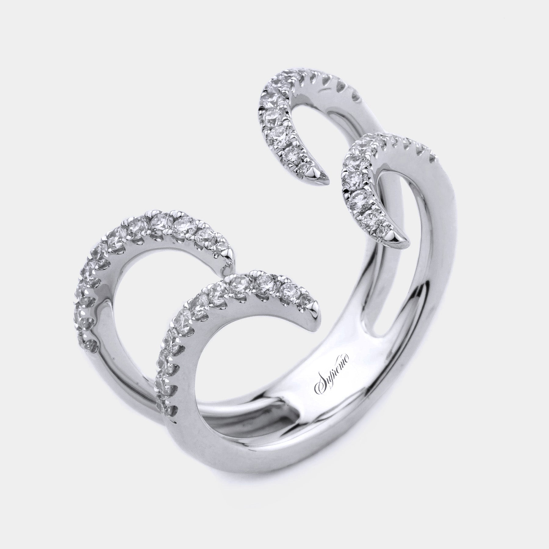 18K white gold open curve fashion ring with pavé-set round diamonds, shown on a grey background in a side angle view.