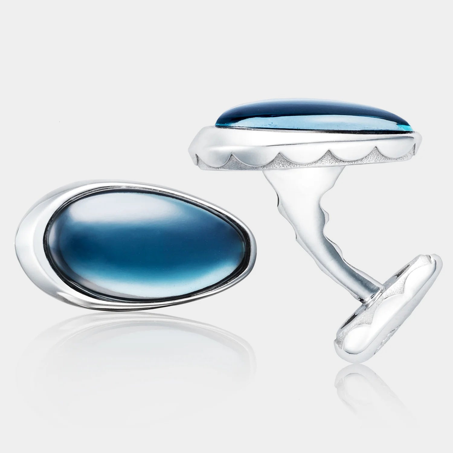 Men’s Sterling Silver Oval Sky Blue Hematite Cufflinks on grey background.