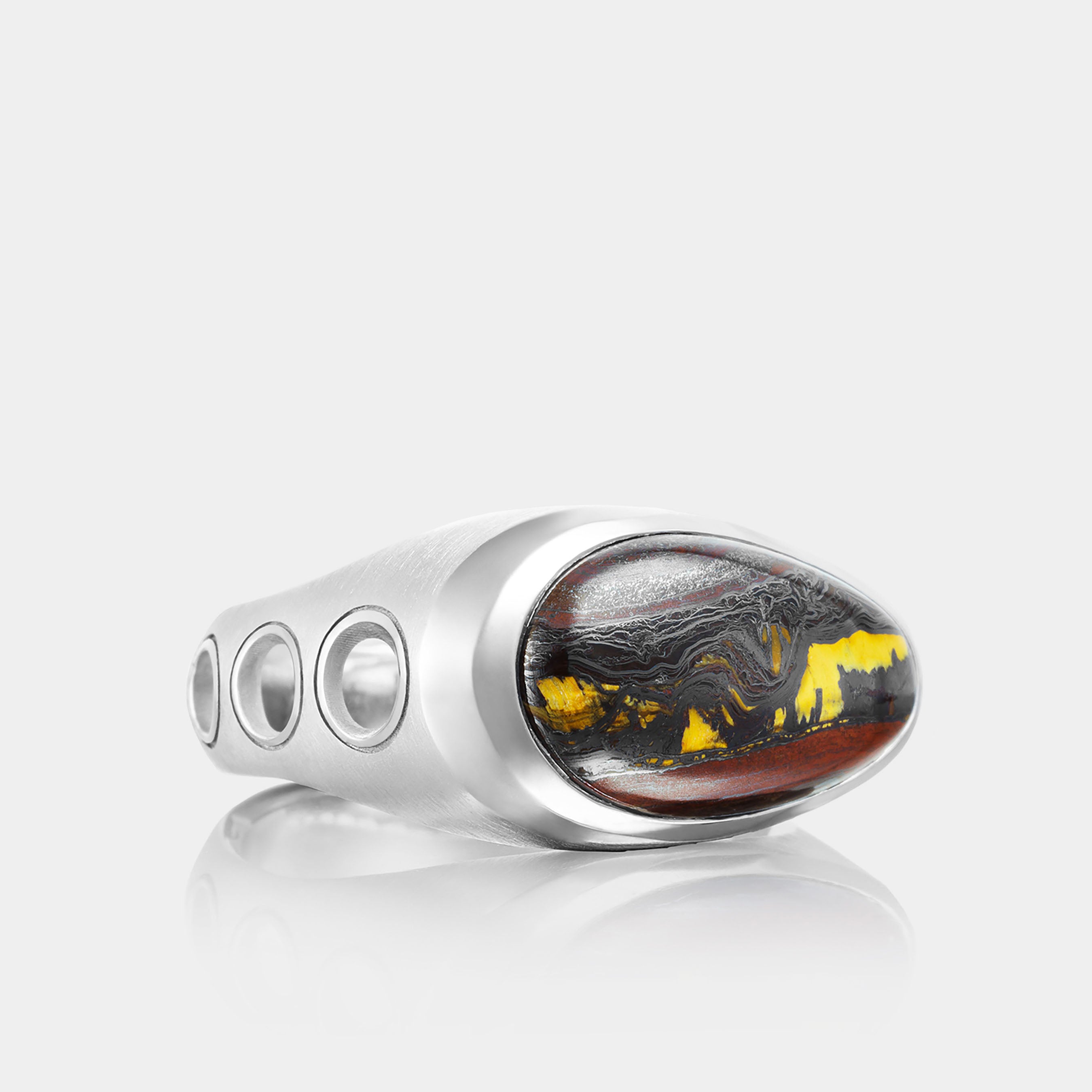 Men’s Sterling Silver Oval Tiger Iron Ring on grey background, front and side view