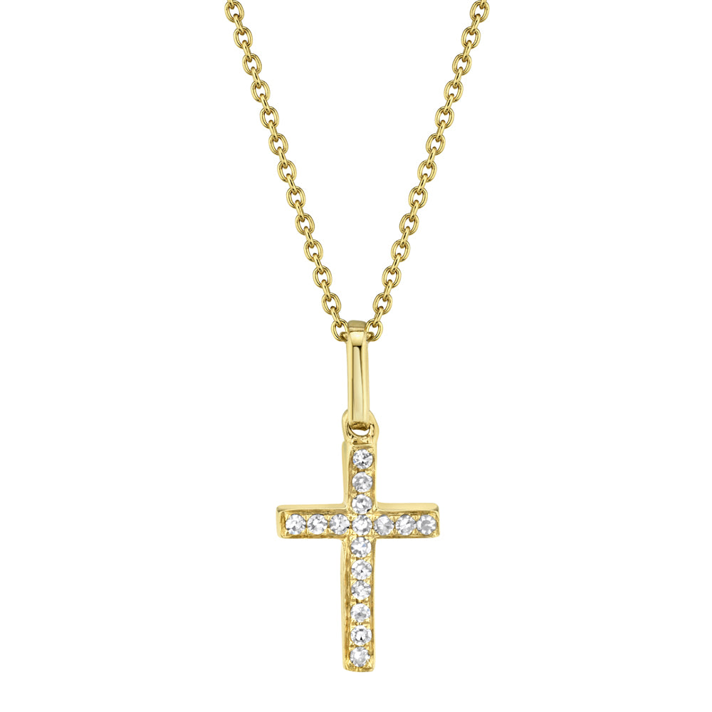 Gold cross necklace with diamonds on a white background