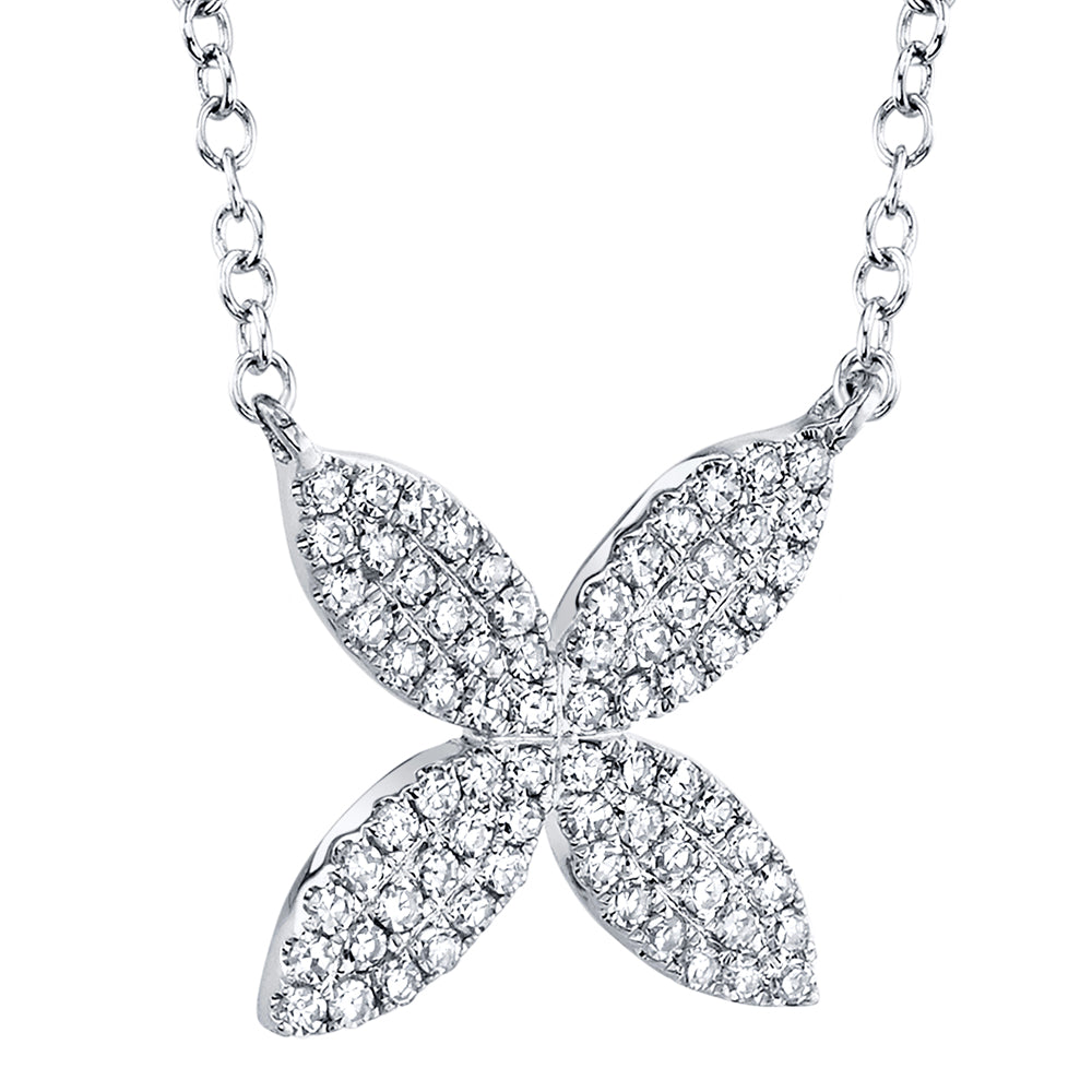 White gold diamond flower pendant necklace, side angle view