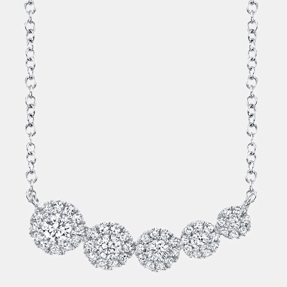 White gold diamond necklace with five diamond solitaire pendants, front view