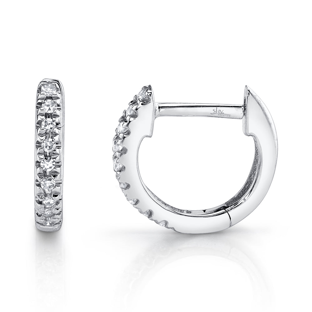 White gold diamond huggie earrings, side view