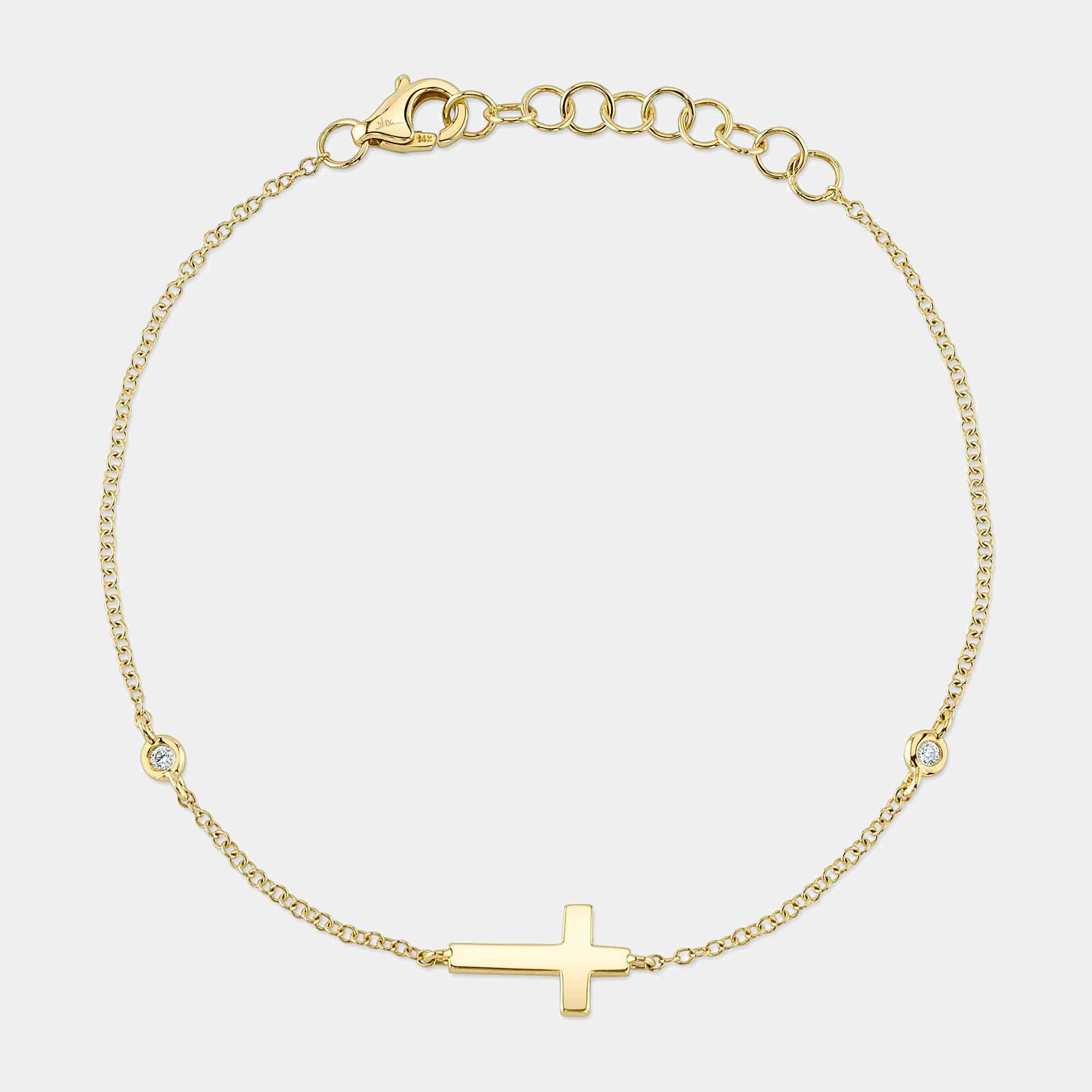 Yellow gold diamond cross charm bracelet, front view
